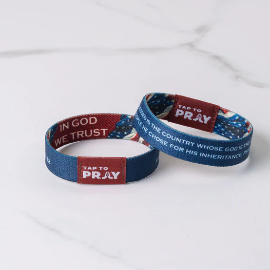 In God We Trust "Tap To Pray" Patriot Wristbands that display text on a white background showing the two reversible sides to it