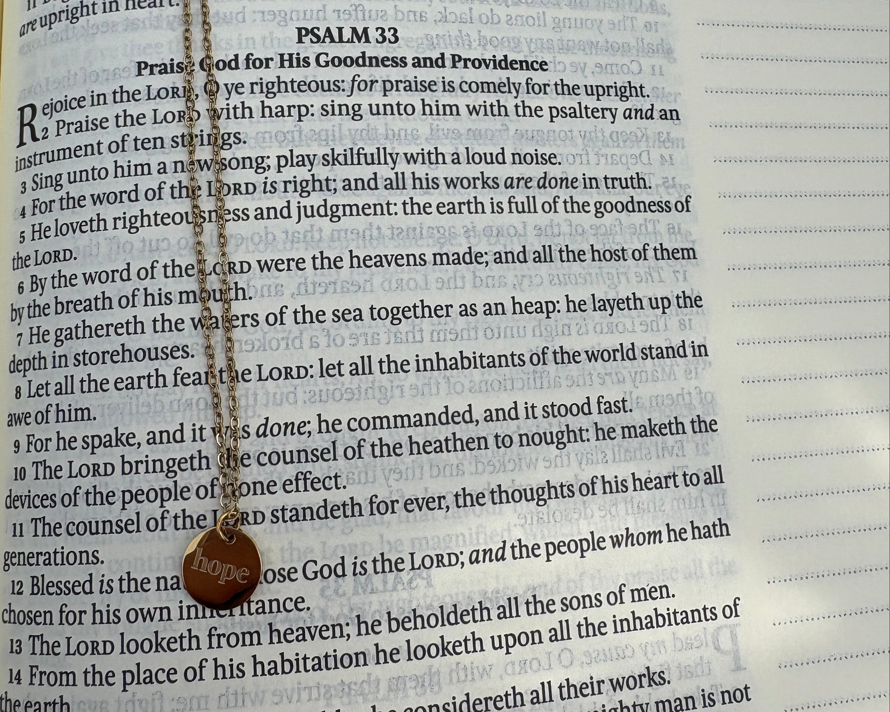 Open bible with a necklace draped over it